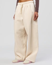 Woman wearing Bree Barrel Fleece Track Pant - Vanilla Bean | Model:Taneisha | Size:XS | Thumbnail Index: 5
