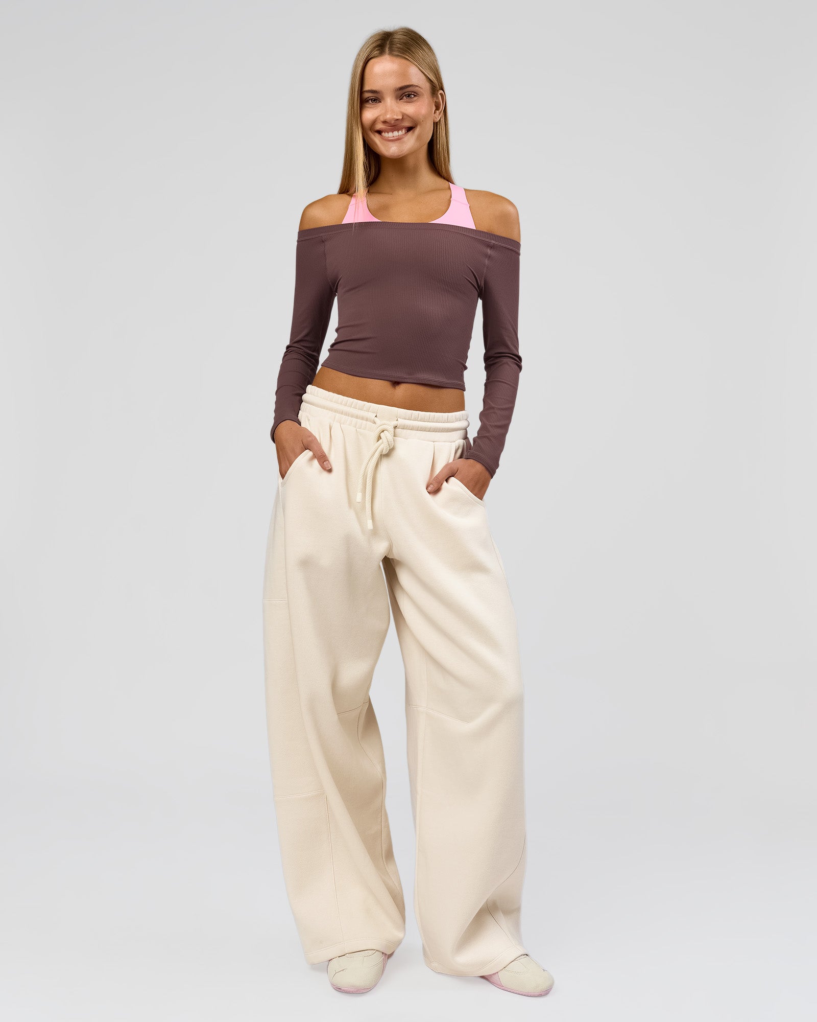 Woman wearing Bree Barrel Fleece Track Pant - Vanilla Bean | Model:Taneisha | Size:XS