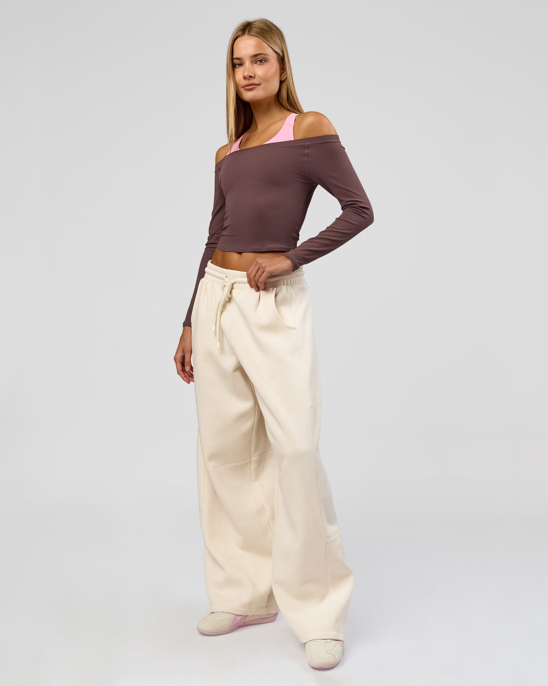 Woman wearing Bree Barrel Fleece Track Pant - Vanilla Bean | Model:Taneisha | Size:XS - view 16