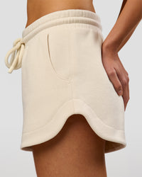 Woman wearing Bree Fleece Track Short - Vanilla Bean | Model:Taneisha | Size:XS | Thumbnail Index: 10