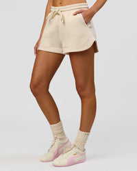 Woman wearing Bree Fleece Track Short - Vanilla Bean | Model:Taneisha | Size:XS | Thumbnail Index: 13