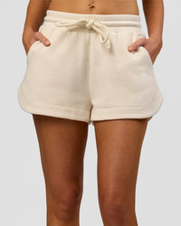 Woman wearing Bree Fleece Track Short - Vanilla Bean | Model:Taneisha | Size:XS | Thumbnail Index: 8