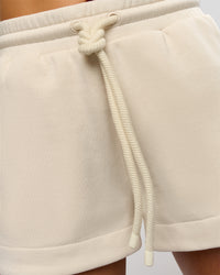 Woman wearing Bree Fleece Track Short - Vanilla Bean | Model:Taneisha | Size:XS | Thumbnail Index: 9