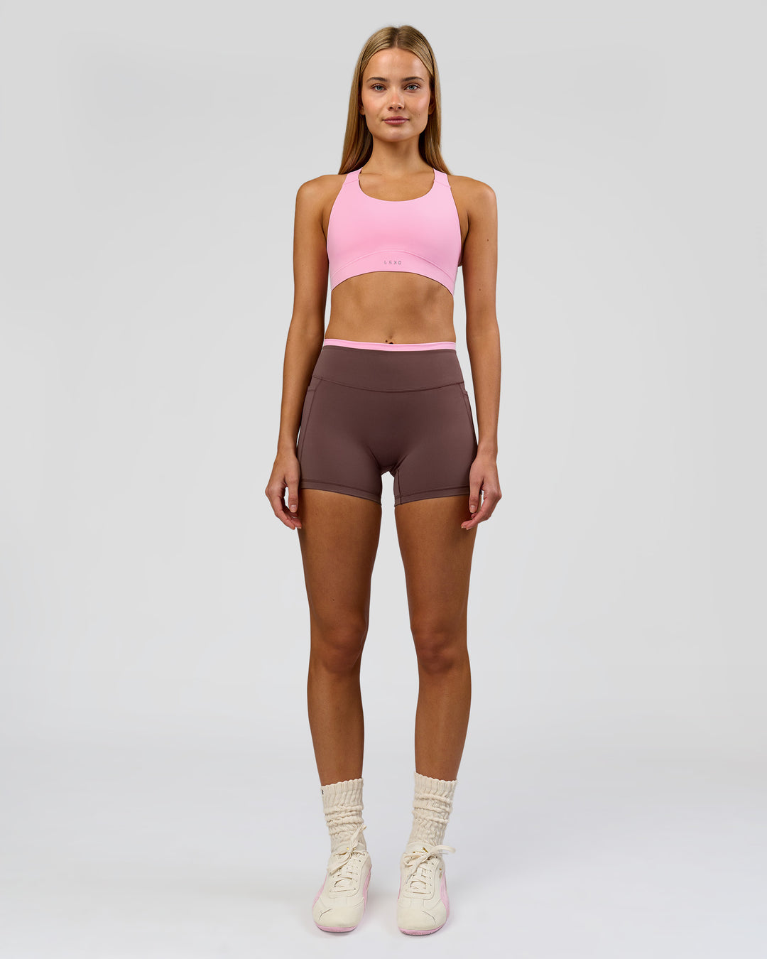 Woman wearing Bree Fusion High-Rise 4" Short Pockets - Cocoa Powder-Pink Rose | Model:Taneisha | Size:XS - view 4