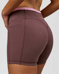 Woman wearing Bree Fusion High-Rise 4" Short Pockets - Cocoa Powder-Pink Rose | Model:Taneisha | Size:XS | Thumbnail Index: 11