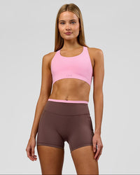 Woman wearing Bree Fusion High-Rise 4" Short Pockets - Cocoa Powder-Pink Rose | Model:Taneisha | Size:XS | Thumbnail Index: 0