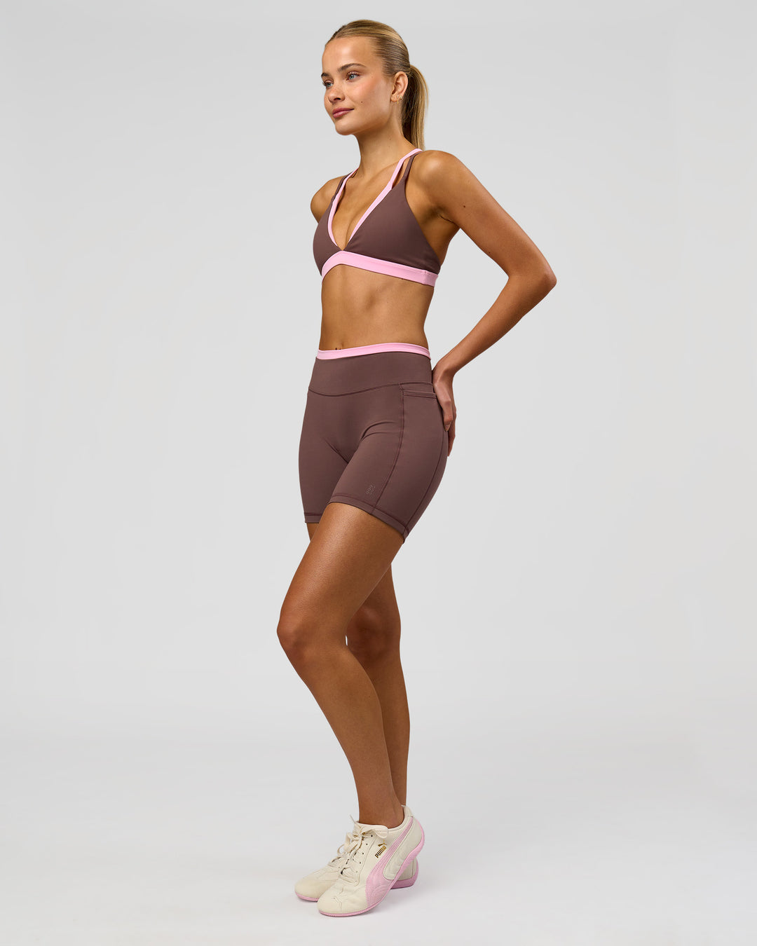Woman wearing Bree Fusion High-Rise 6" Short Pockets - Cocoa Powder-Pink Rose | Model:Taneisha | Size:XS - view 9