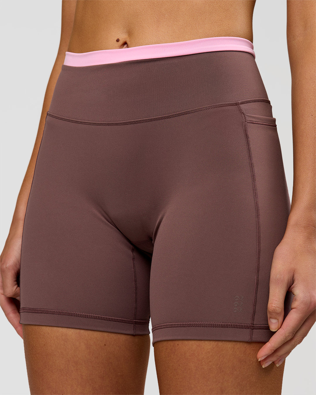 Woman wearing Bree Fusion High-Rise 6" Short Pockets - Cocoa Powder-Pink Rose | Model:Taneisha | Size:XS - view 1