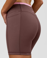 Woman wearing Bree Fusion High-Rise 6" Short Pockets - Cocoa Powder-Pink Rose | Model:Taneisha | Size:XS | Thumbnail Index: 11