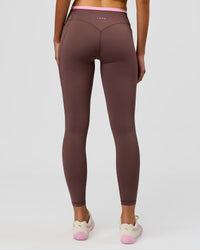 Woman wearing Bree Fusion High-Rise Full Length Legging Pockets - Cocoa Powder-Pink Rose | Model:Taneisha | Size:XS | Thumbnail Index: 1