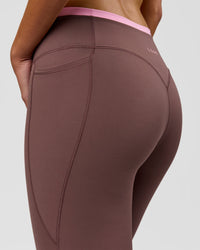 Woman wearing Bree Fusion High-Rise Full Length Legging Pockets - Cocoa Powder-Pink Rose | Model:Taneisha | Size:XS | Thumbnail Index: 11