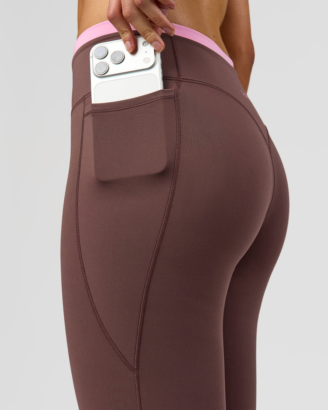 Woman wearing Bree Fusion High-Rise Full Length Legging Pockets - Cocoa Powder-Pink Rose | Model:Taneisha | Size:XS - view 5