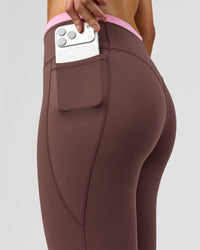 Woman wearing Bree Fusion High-Rise Full Length Legging Pockets - Cocoa Powder-Pink Rose | Model:Taneisha | Size:XS | Thumbnail Index: 4