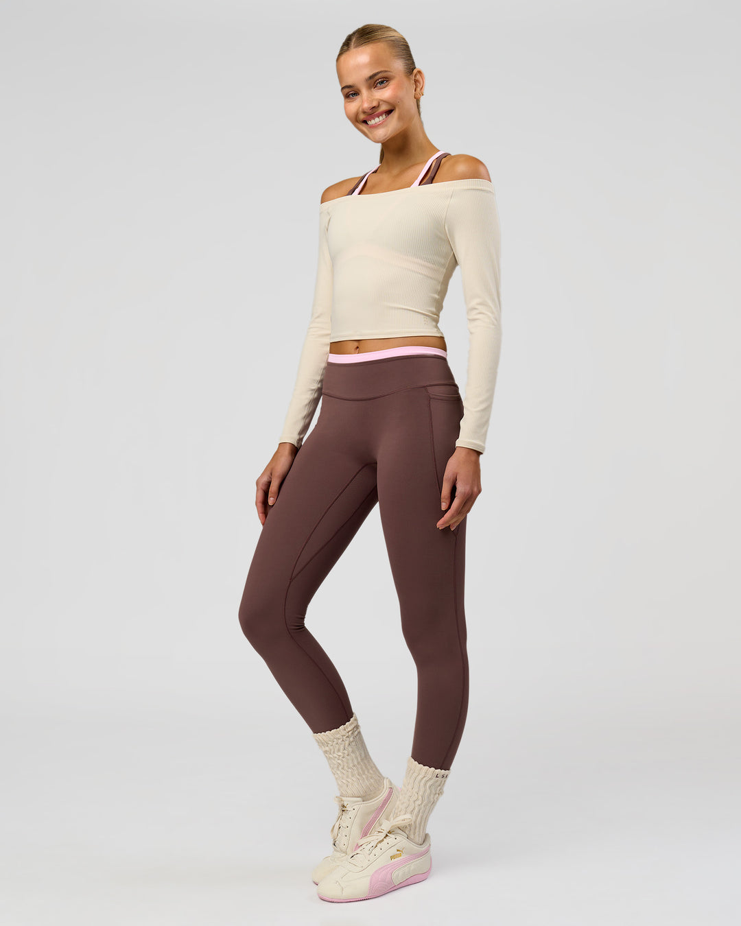 Woman wearing Bree Fusion High-Rise Full Length Legging Pockets - Cocoa Powder-Pink Rose | Model:Taneisha | Size:XS - view 11