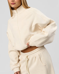 Woman wearing Bree Oversized Fleece Zip Thru - Vanilla Bean | Model:Taneisha | Size:XS | Thumbnail Index: 0