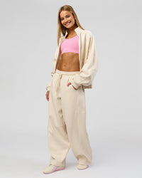 Woman wearing Bree Oversized Fleece Zip Thru - Vanilla Bean | Model:Taneisha | Size:XS | Thumbnail Index: 3