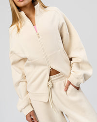 Woman wearing Bree Oversized Fleece Zip Thru - Vanilla Bean | Model:Taneisha | Size:XS | Thumbnail Index: 4