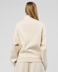 Woman wearing Bree Oversized Fleece Zip Thru - Vanilla Bean | Model:Taneisha | Size:XS | Thumbnail Index: 5