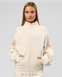 Woman wearing Bree Oversized Fleece Zip Thru - Vanilla Bean | Model:Taneisha | Size:XS | Thumbnail Index: 8