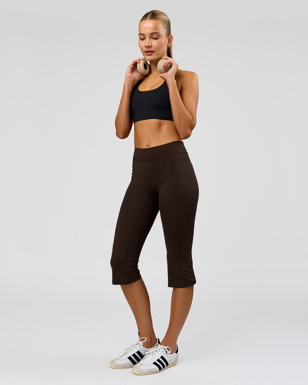 Woman wearing Deep V-Contour High-Rise Flared Capri - Ground Coffee | Model:Taneisha | Size:XS - view 1