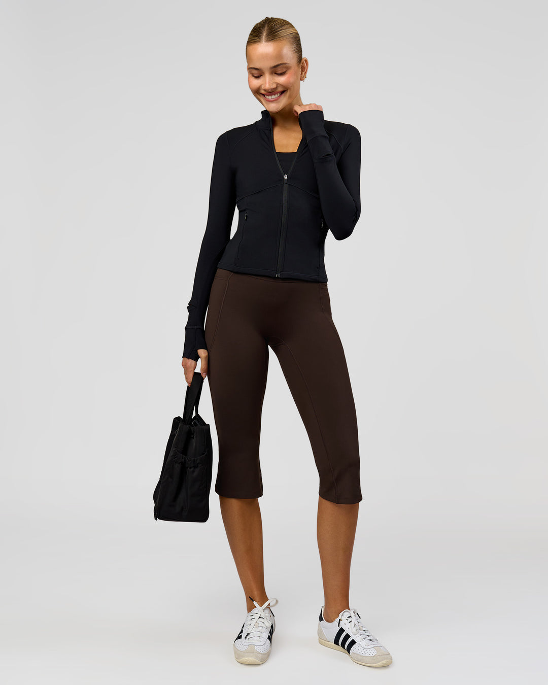 Woman wearing Deep V-Contour High-Rise Flared Capri - Ground Coffee | Model:Taneisha | Size:XS - view 15