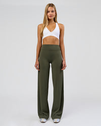 Woman wearing Elixir High-Rise Tall Pant - Pure Olive | Model:Taneisha | Size:XS | Thumbnail Index: 0