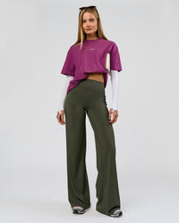 Woman wearing Elixir High-Rise Tall Pant - Pure Olive | Model:Taneisha | Size:XS | Thumbnail Index: 1