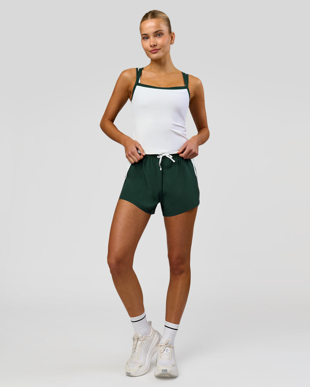 Woman wearing Flame Ribbed Regular Length Tank - White-Midnight Green | Model:Taneisha | Size:XS - view 12