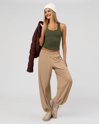 Woman wearing Flow Rib Scoop Neck Tank - Pure Olive | Model:Taneisha | Size:XS | Thumbnail Index: 3