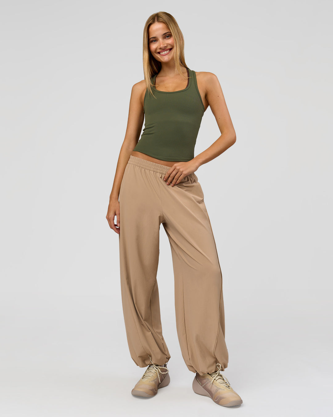 Woman wearing Flow Rib Scoop Neck Tank - Pure Olive | Model:Taneisha | Size:XS - view 8