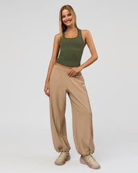 Woman wearing Flow Rib Scoop Neck Tank - Pure Olive | Model:Taneisha | Size:XS | Thumbnail Index: 7