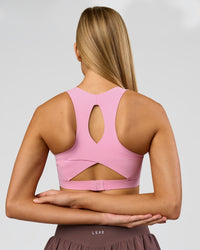 Woman wearing Fusion Sports Bra 2.0 - Pink Rose | Model:Taneisha | Size:XS | Thumbnail Index: 0