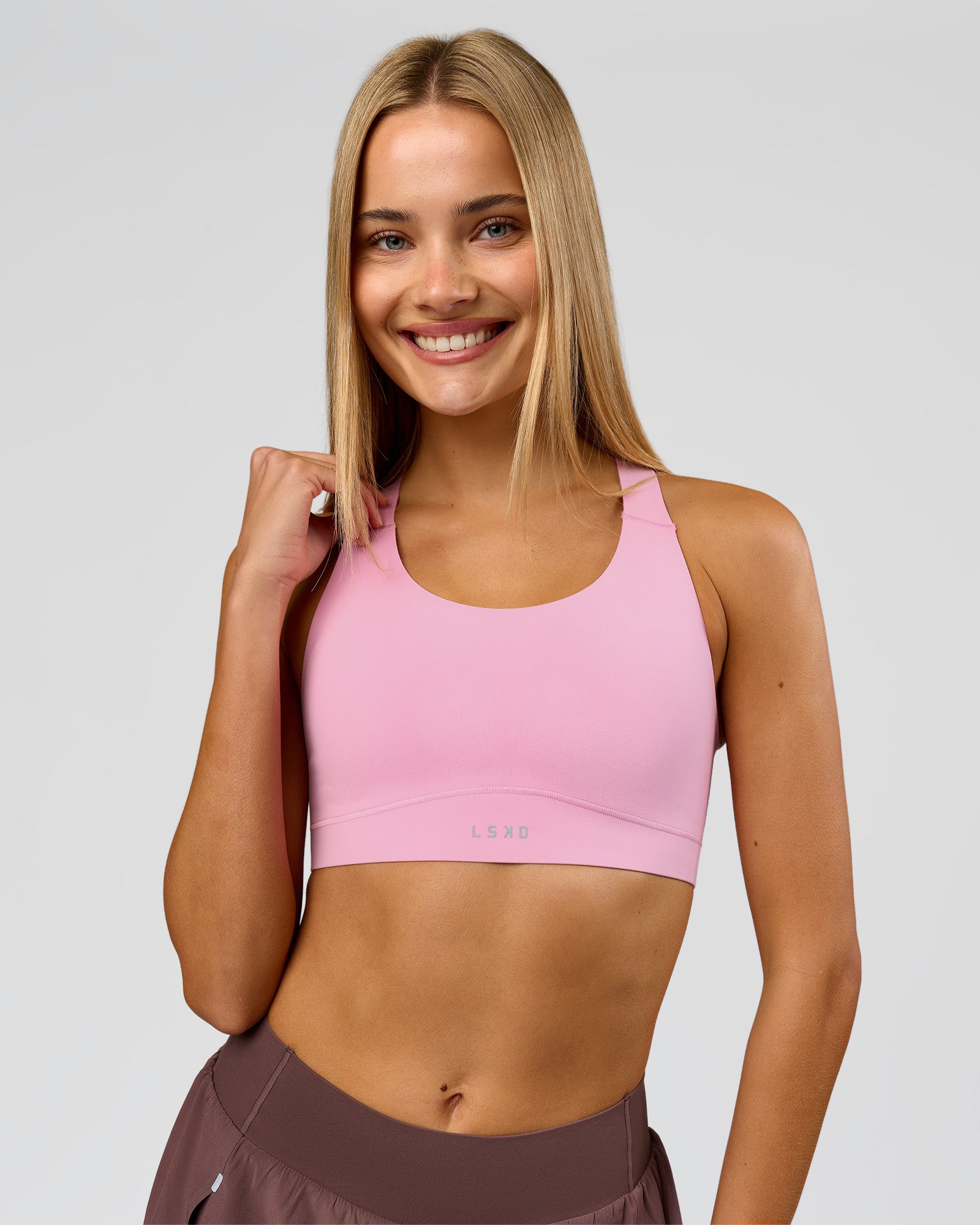 Woman wearing Fusion Sports Bra 2.0 - Pink Rose | Model:Taneisha | Size:XS