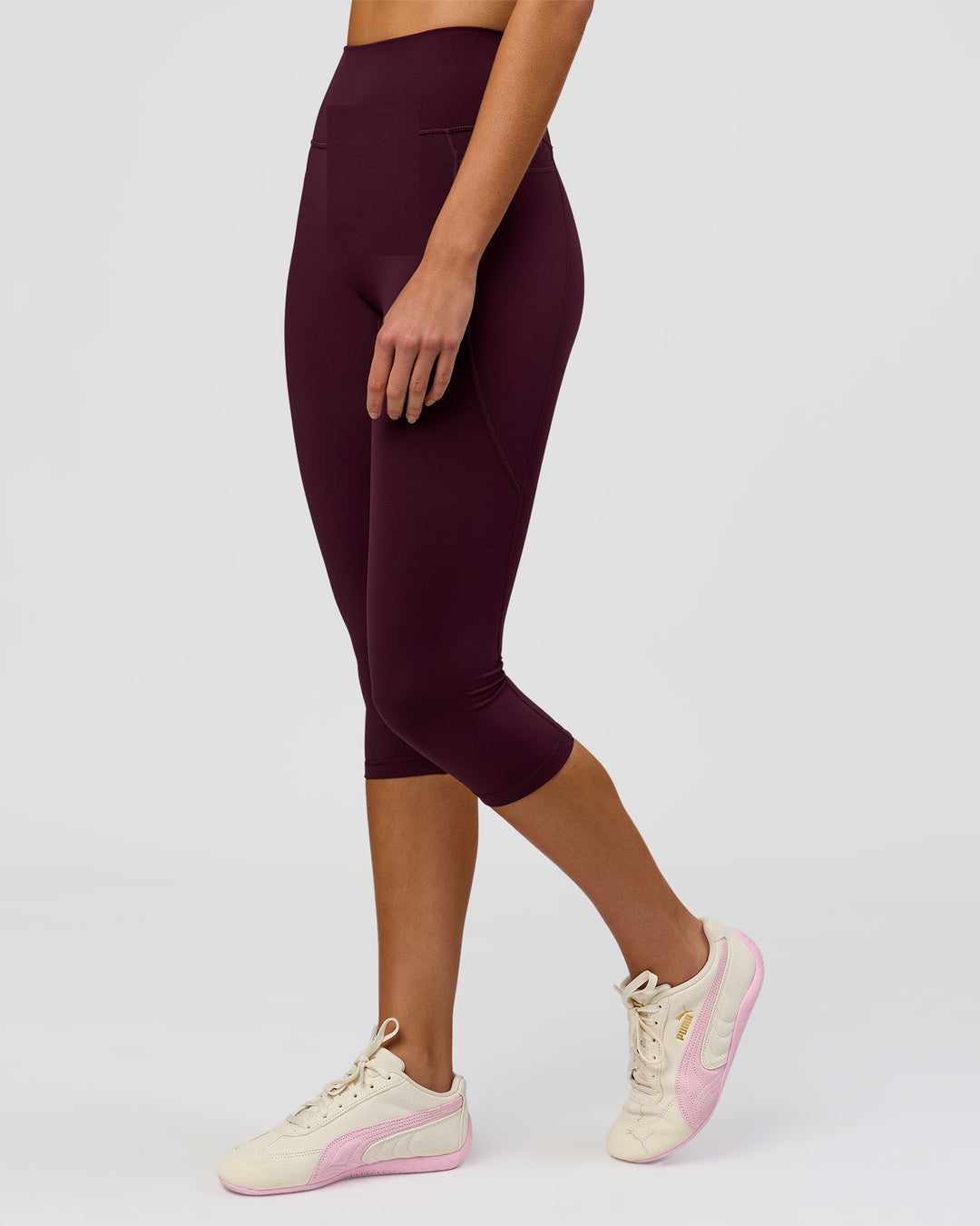 Woman wearing Fusion Ultra High-Rise 3/4 Legging Pockets - Cherry Lacquer | Model:Taneisha | Size:XS - view 2