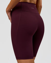 Woman wearing Fusion Ultra High-Rise 9" Short Pockets - Cherry Lacquer | Model:Taneisha | Size:XS | Thumbnail Index: 4