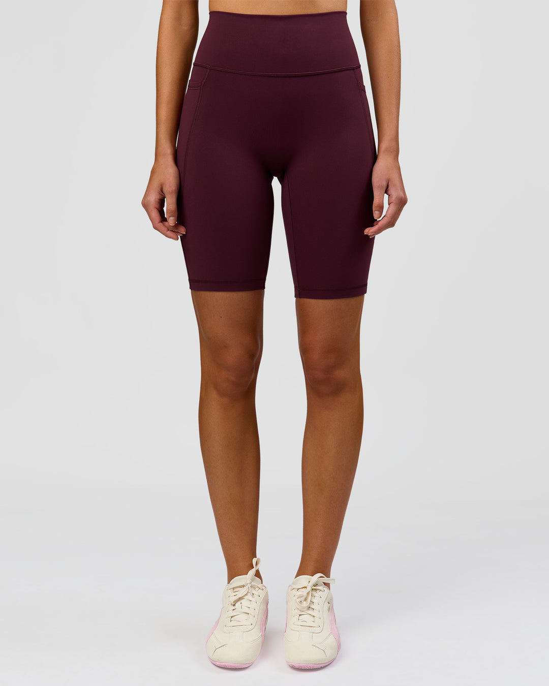 Woman wearing Fusion Ultra High-Rise 9" Short Pockets - Cherry Lacquer | Model:Taneisha | Size:XS - view 8