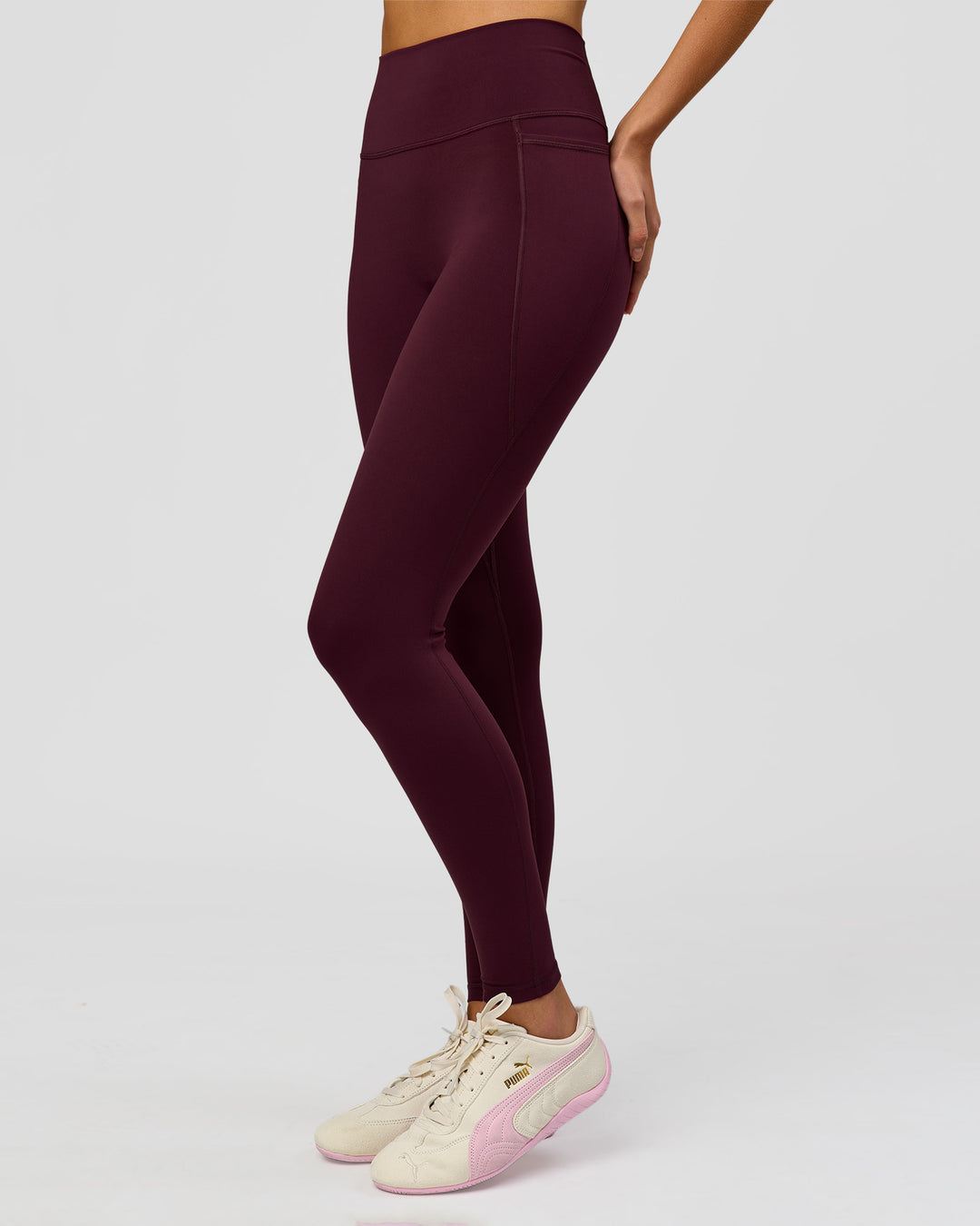 Woman wearing Fusion V-Contour Ultra High-Rise Full Length Legging Pockets - Cherry Lacquer | Model:Taneisha | Size:XS - view 4