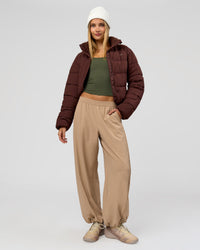Woman wearing Go-To Puffer Jacket - Hot Chocolate | Model:Taneisha | Size:XS