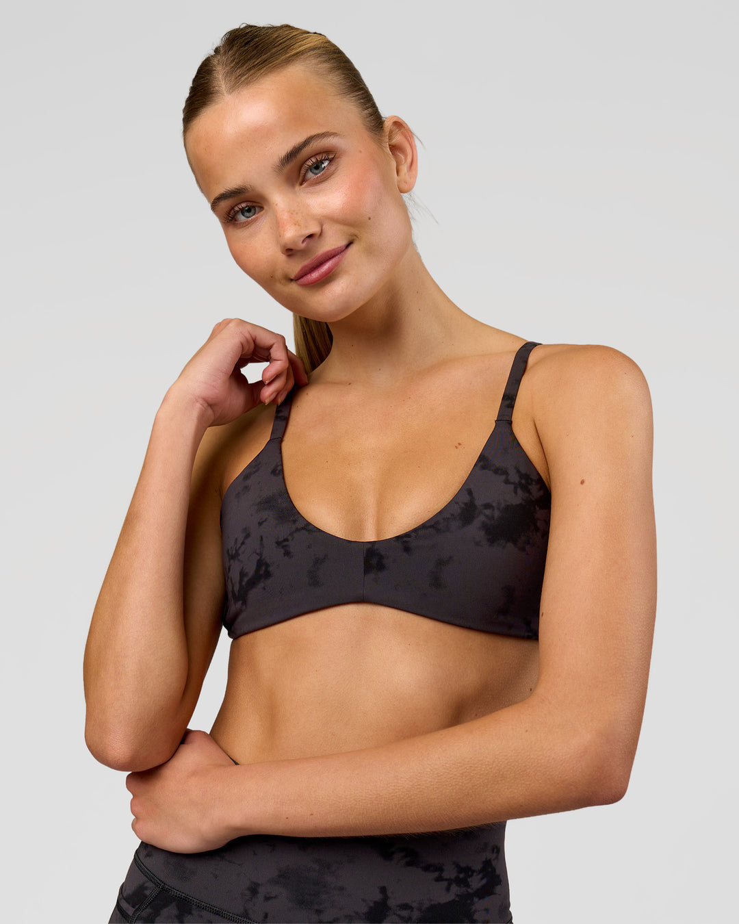 Woman wearing Minimal Sports Bra - Black Tie Dye | Model:Taneisha | Size:XS - view 4
