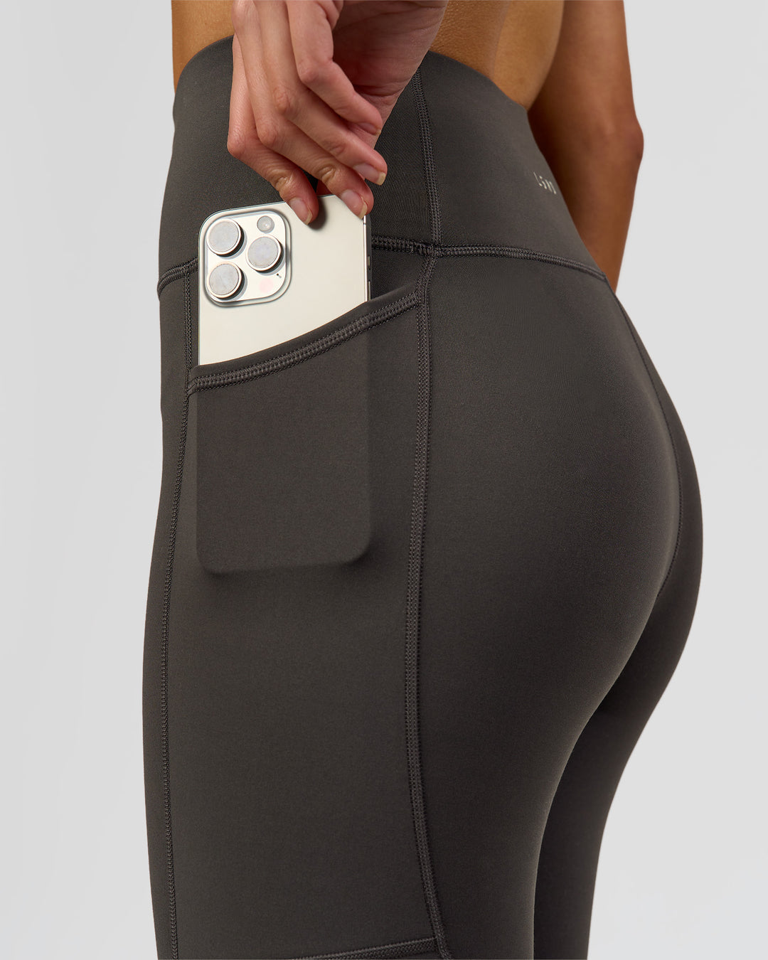 Woman wearing Rep Ultra High-Rise Full Length Legging Pockets - Onyx-white | Model:Taneisha | Size:XS - view 2