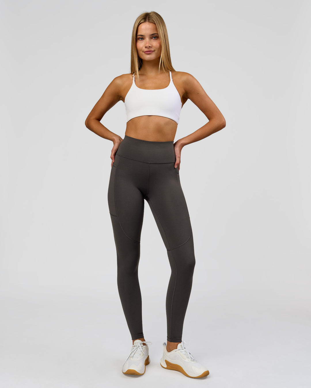 Woman wearing Rep Ultra High-Rise Full Length Legging Pockets - Onyx-white | Model:Taneisha | Size:XS - view 3