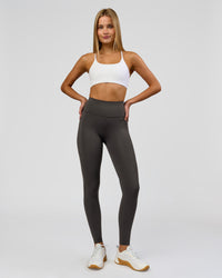 Woman wearing Rep Ultra High-Rise Full Length Legging Pockets - Onyx-white | Model:Taneisha | Size:XS | Thumbnail Index: 2
