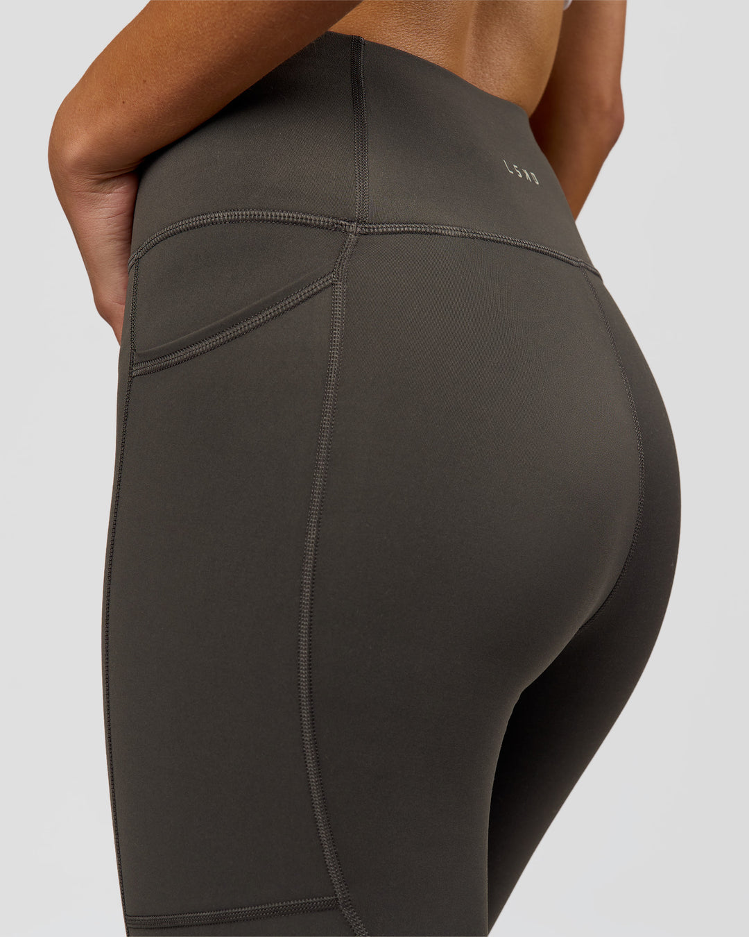 Woman wearing Rep Ultra High-Rise Full Length Legging Pockets - Onyx-white | Model:Taneisha | Size:XS - view 4