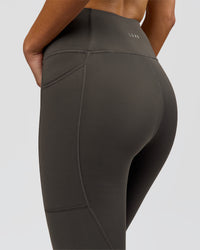 Woman wearing Rep Ultra High-Rise Full Length Legging Pockets - Onyx-white | Model:Taneisha | Size:XS | Thumbnail Index: 4
