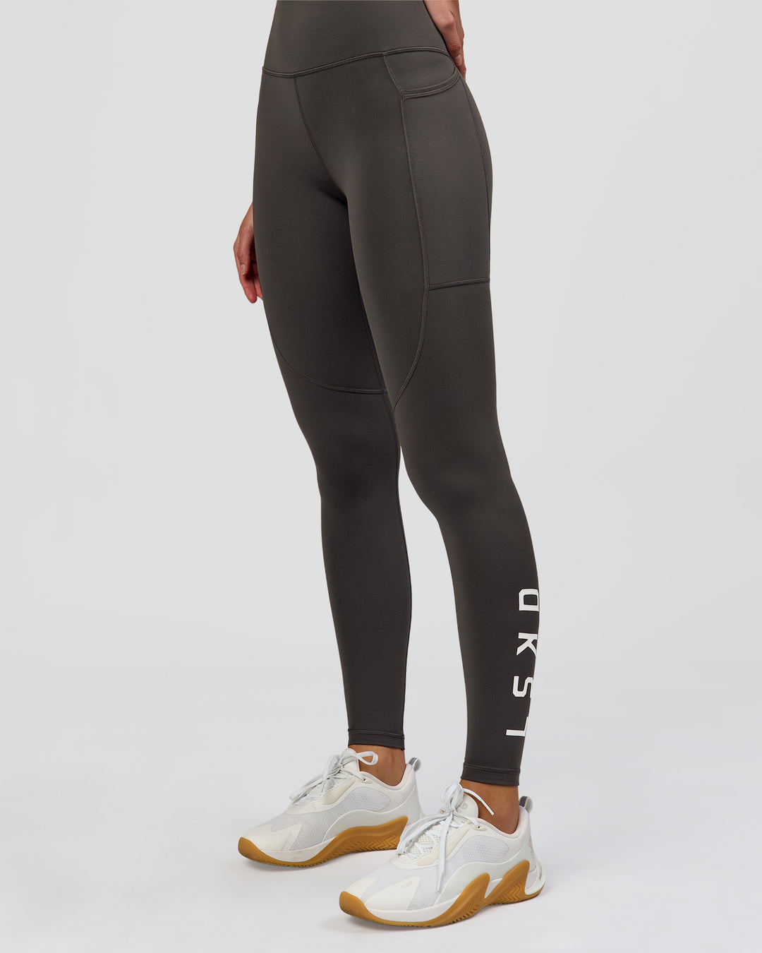 Woman wearing Rep Ultra High-Rise Full Length Legging Pockets - Onyx-white | Model:Taneisha | Size:XS - view 9