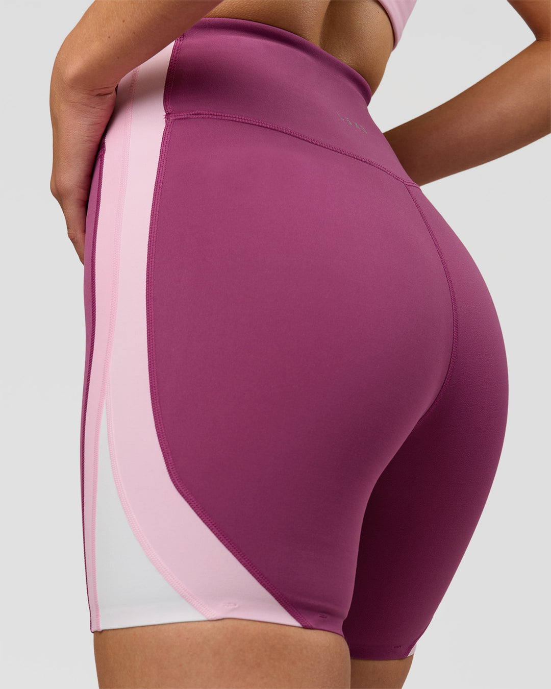 Woman wearing Revitalise Ultra High-Rise 6" Short - Boysenberry-Pink Rose | Model:Taneisha | Size:XS - view 3