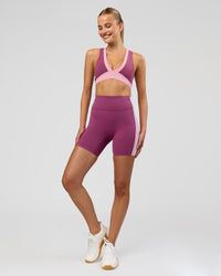 Woman wearing Revitalise Ultra High-Rise 6" Short - Boysenberry-Pink Rose | Model:Taneisha | Size:XS | Thumbnail Index: 3