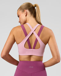 Woman wearing Stamina Layered Sports Bra - Boysenberry-Pink Rose | Model:Taneisha | Size:XS | Thumbnail Index: 0