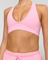 Woman wearing Stamina Sports Bra - Pink Rose | Model:Taneisha | Size:XS