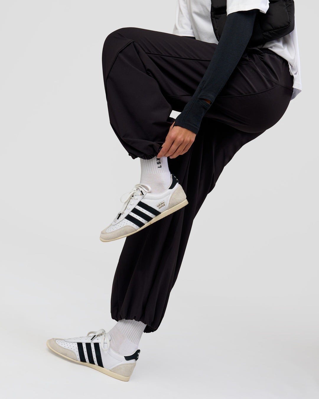 Woman wearing Stitch Up Track Pant - Black | Model:Taneisha | Size:XS - view 3